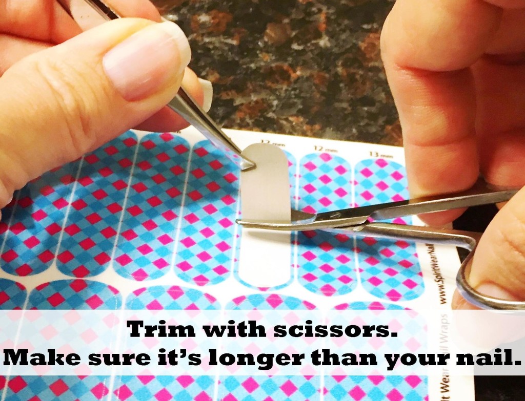cut-nail-wraps-with-scissors