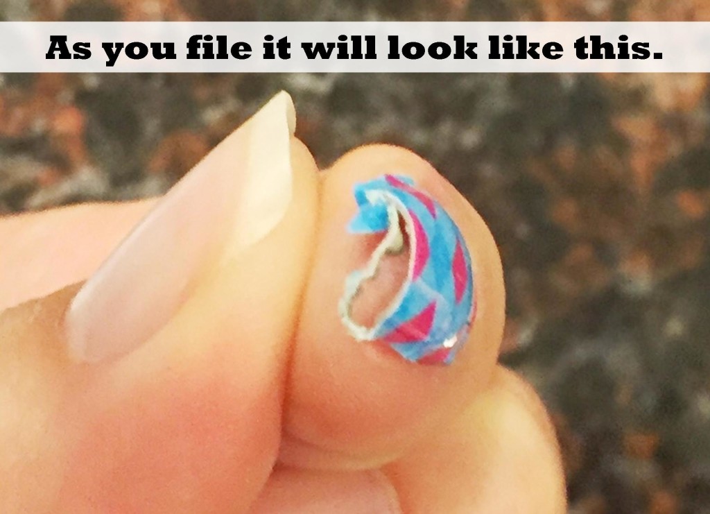 extra-nail-wrap-filed-off-end-of-fingernail