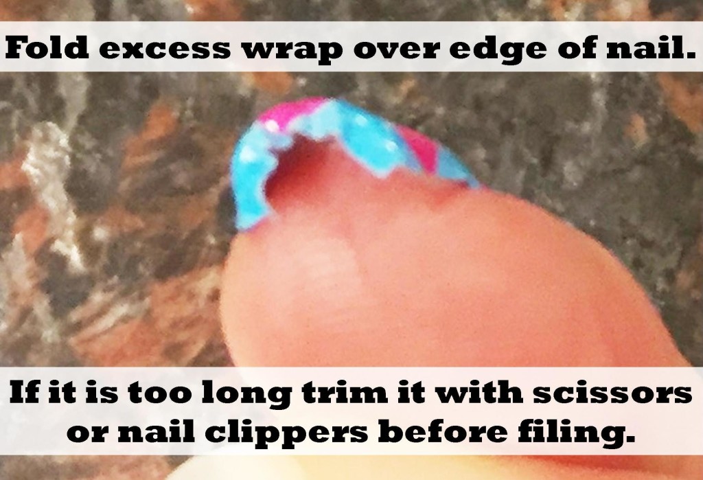 fold-excess-wrap-over-the-top-of-the-fingernail