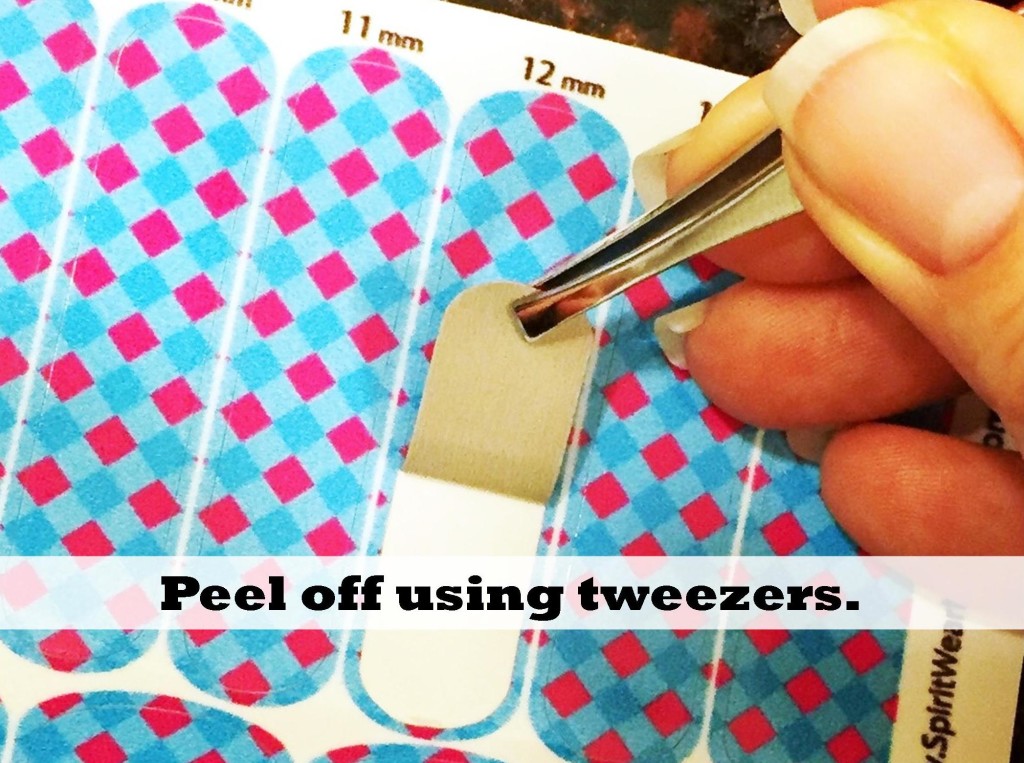 hold-fingernail-wrap-with-tweezers-at-bottom