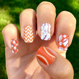 Dark Orange and White Baseball Nails