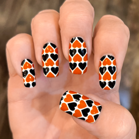 Dark Orange and Black Hearts over White Nail Wraps