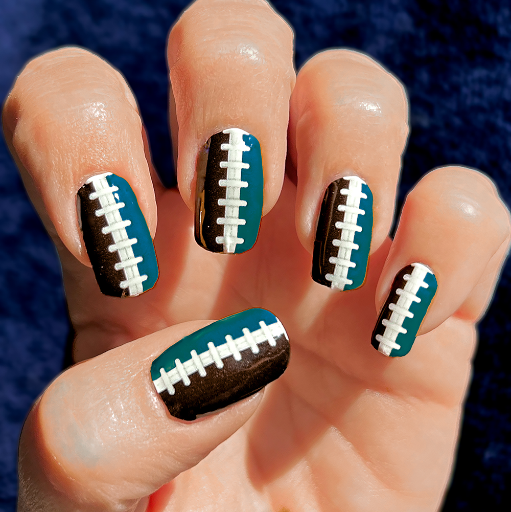 Football Stitching Nail Art | Midnight Green & Black Background